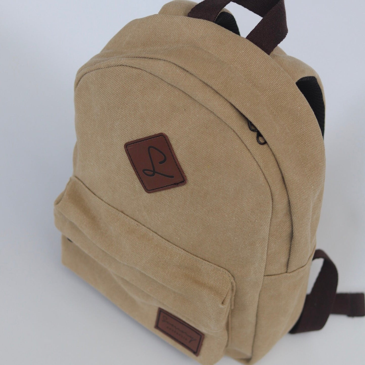 Beige Backpack (Slightly Faded)